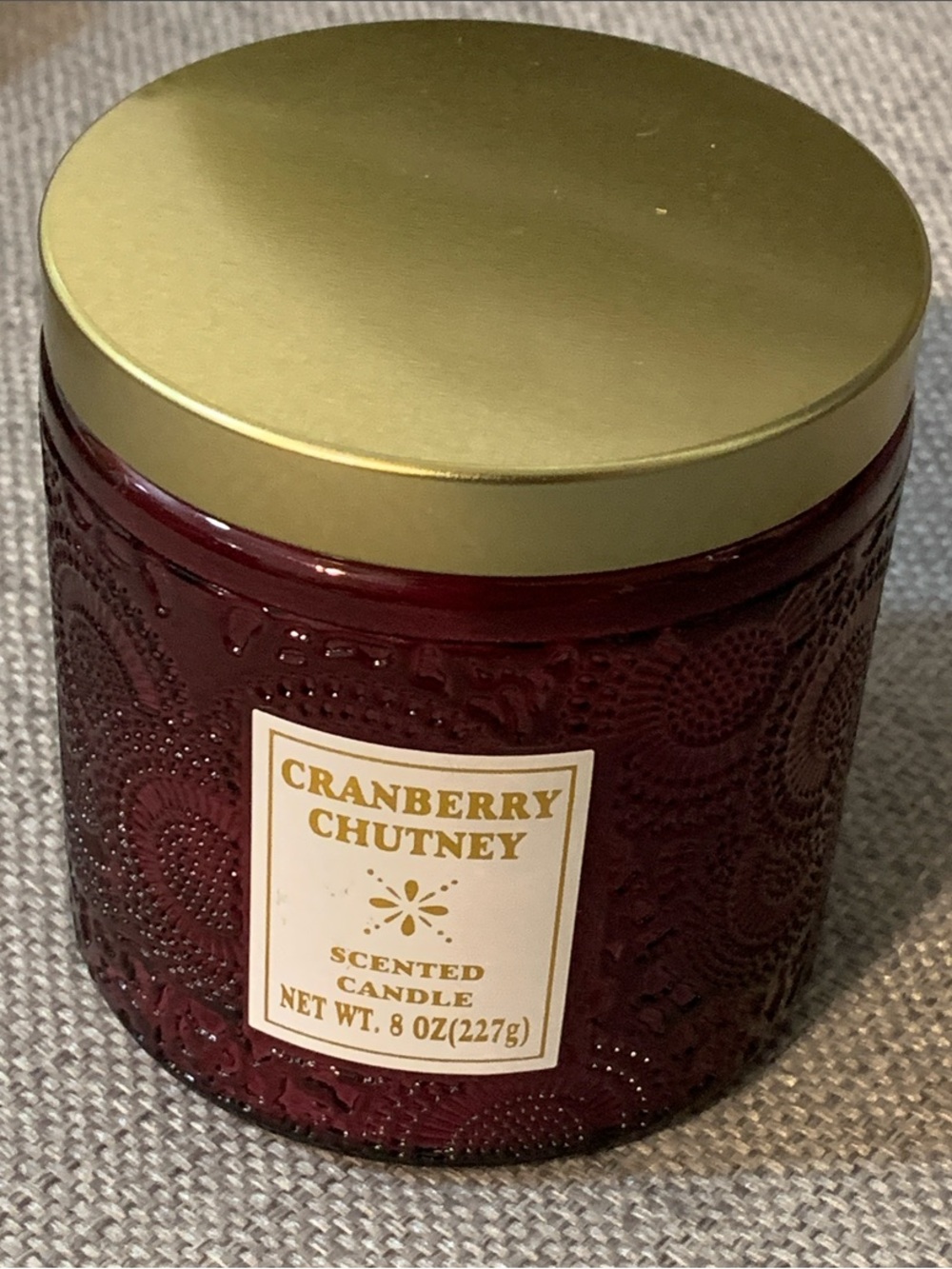 Cranberry Chutney Scented Candle — Deep Burgundy Textured Jar with Gold Tone Lid